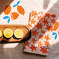 Orange Stars on Blush Dinner Napkins