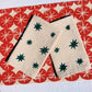 Green Stars on Oatmeal Dinner Napkins