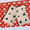 Green Stars on Oatmeal Dinner Napkins
