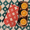 Red Ornaments on Oatmeal Dinner Napkins