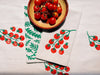 Tomatoes on White Dinner Napkins