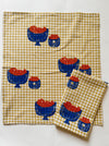 Orange Bowl on Mustard Gingham Dinner Napkins