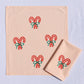 Candy Cane Bow on Blush Dinner Napkins