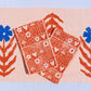 Garden Squares on Blush Dinner Napkins