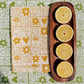 Garden Squares on Mustard Dinner Napkins
