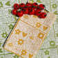 Garden Squares on Mustard Dinner Napkins