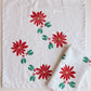 Poinsettia on White Dinner Napkins