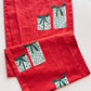 Presents on Red Table Runner