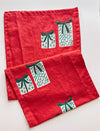 Presents on Red Table Runner