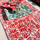 Poinsettia Petal Burst Table Runner