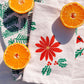 Poinsettia on White Dinner Napkins