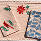 Pine Needles on Blush Dinner Napkins
