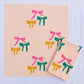 Holiday Bows on Blush Dinner Napkins