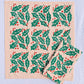 Holly Toss on Blush Dinner Napkins