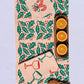 Holly Toss on Blush Table Runner