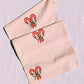 Candy Cane Bows on Blush Table Runner