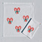 Candy Cane Bows on White Dinner Napkins
