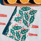 Holly Toss on White Dinner Napkins
