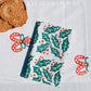Holly Toss on White Dinner Napkins