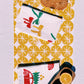 Ochre Ornaments on White Table Runner