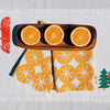 Ochre Ornaments on White Dinner Napkins