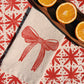 Striped Bow on Oatmeal Dinner Napkins