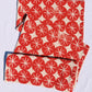 Red Ornaments on Oatmeal Table Runner