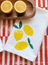 Lemons on White Dinner Napkins